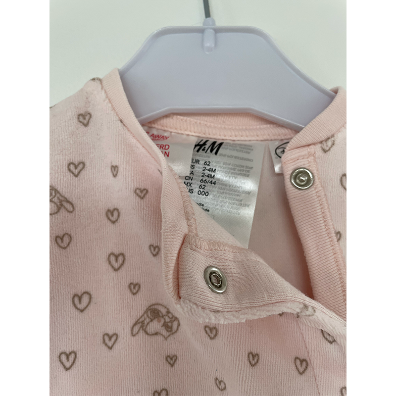 H&M lyserød disney natdragt med fødder str. 62